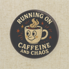 “Running on Caffeine and Chaos” Button Pin | 1.25”