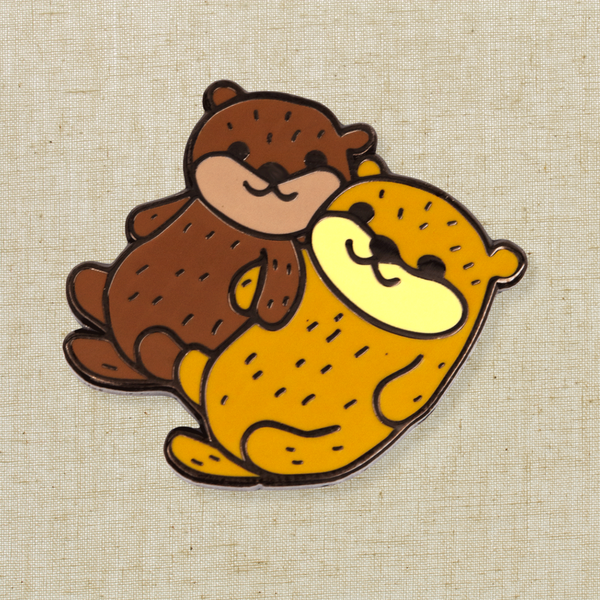 Holding Hands Otters Pin