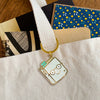 Book Lover Enamel Keychain