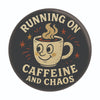 “Running on Caffeine and Chaos” Button Pin | 1.25”